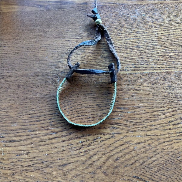 Gold antique seed beaded bracelet with Stormie signature leather tie adjustable closure