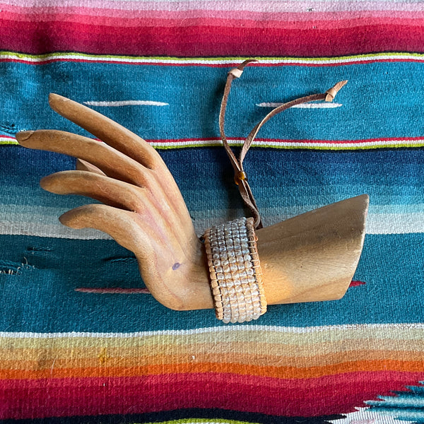 citrine gemstone beaded bracelet side view on blue background on mannequin hand stormie art jewelry