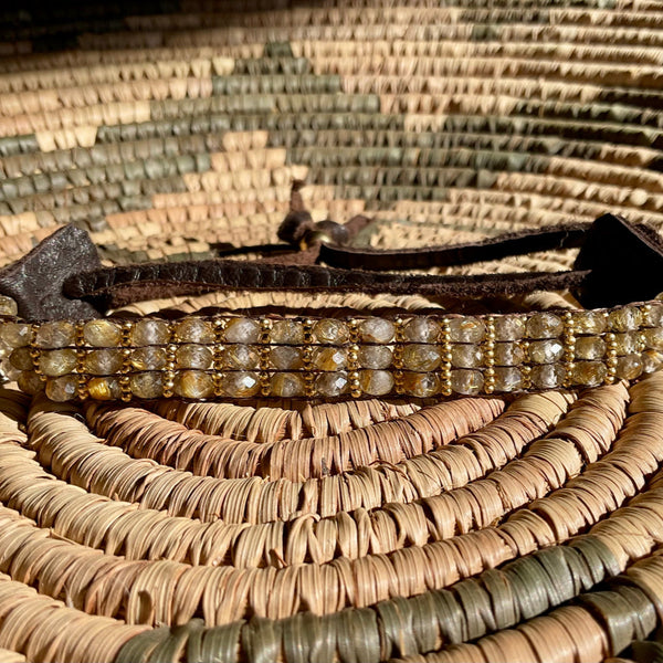 handmade citrine gemstone beaded bracelet front view brown background