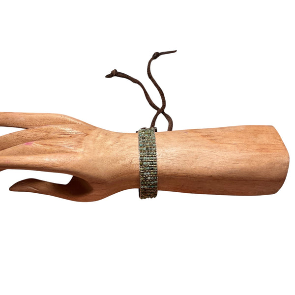 wrist white background with turquoise bracelet