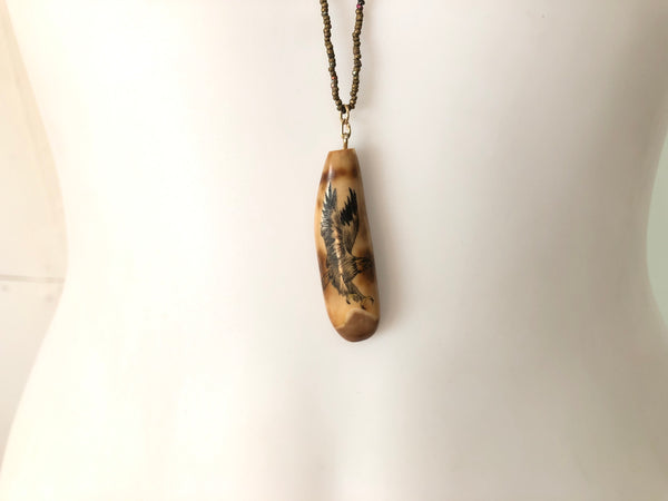 eagle shimsaw necklace