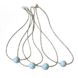 Round Pearl Necklace beaded with antique mixed micro seed beads with a lobster clasp closure.