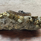 A Movie Star Bracelet Stormie Original Hand Beaded Design with Rare antique mixed metal seed beads custom hand finished with black leather and a Brass pony bead adjustable fits most sizes
