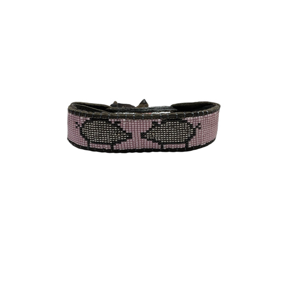 pink bracelet with pig beaded design front view