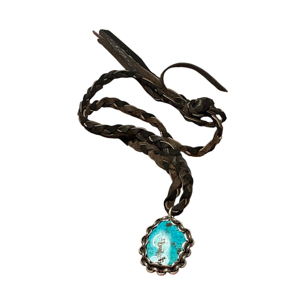 Necklace with a turquoise pendant on a white background
